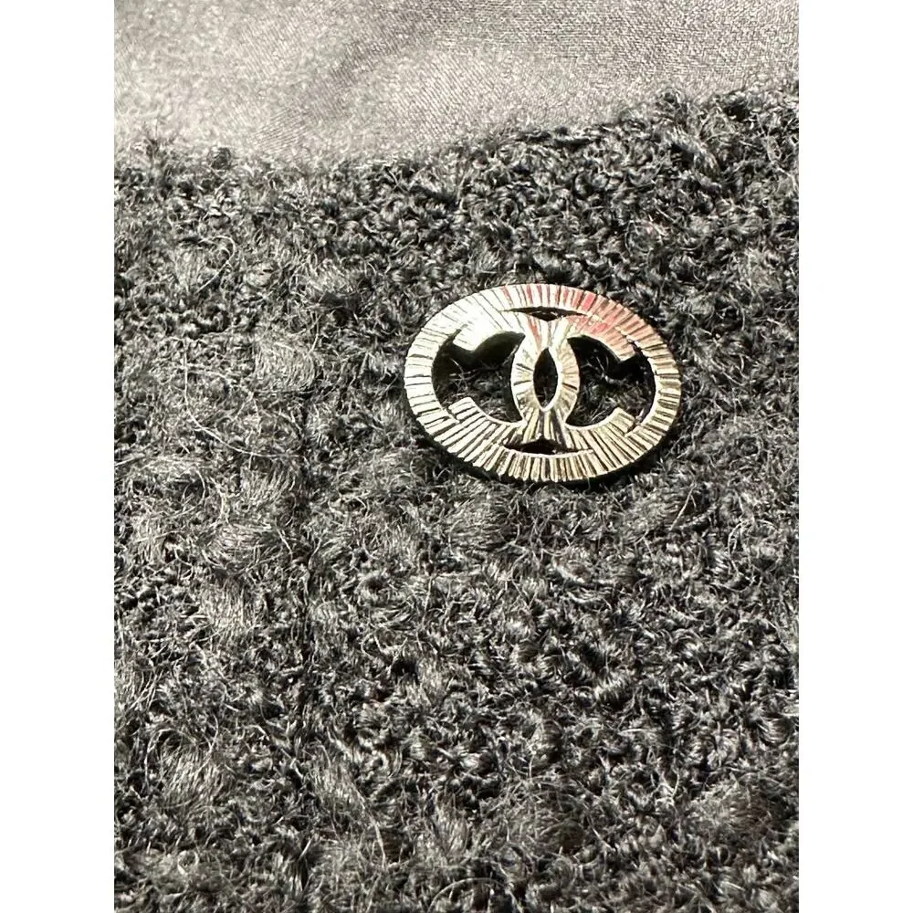 CHANEL Black Bouclé Wool A-Line Skirt with CC Button - FR 48